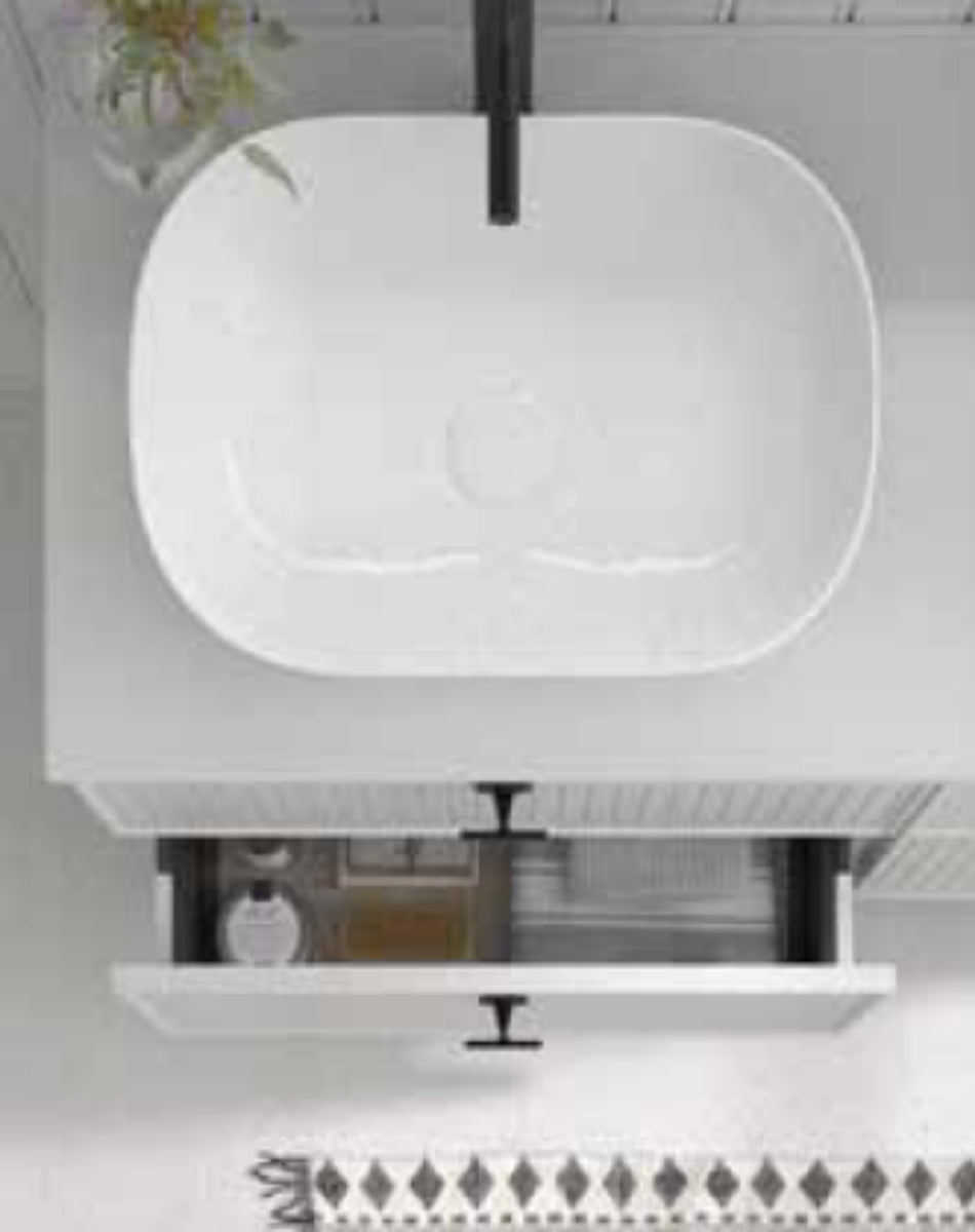 Mueble baño blanco encimera blanca diseño monocromático moderno elegante Errefe Home